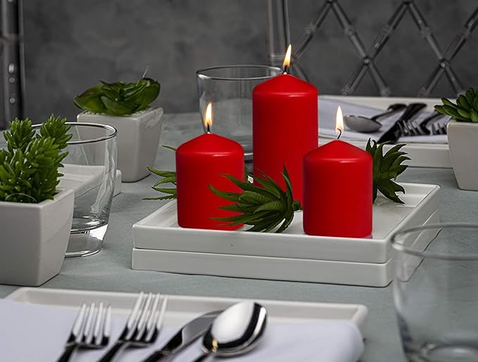 BOLSIUS 4 Count 2x4 Inch Red Pillar Candles - 20 Hours Burn Time - Premium European Quality - Unscented Dripless and Smokeless Wedding, Party, Dinner, Restaurant, and Special Occasion Candle Set