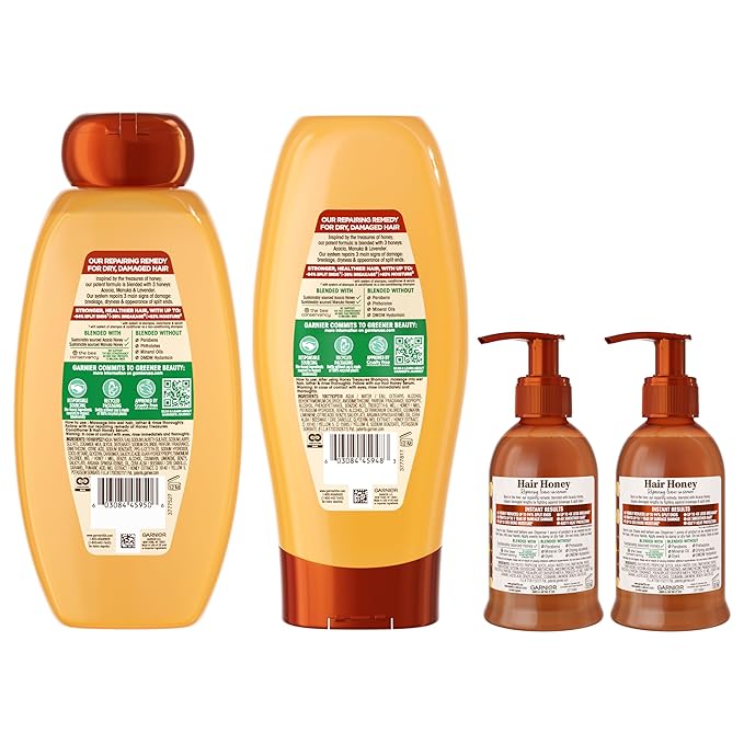 Garnier Whole Blends Honey Treasures Repairing Shampoo & Conditioner 22 Fl Oz each + Hair Serum (5.1 Fl Oz) for Dry, Damaged Hair (Bundle of 4 Items)